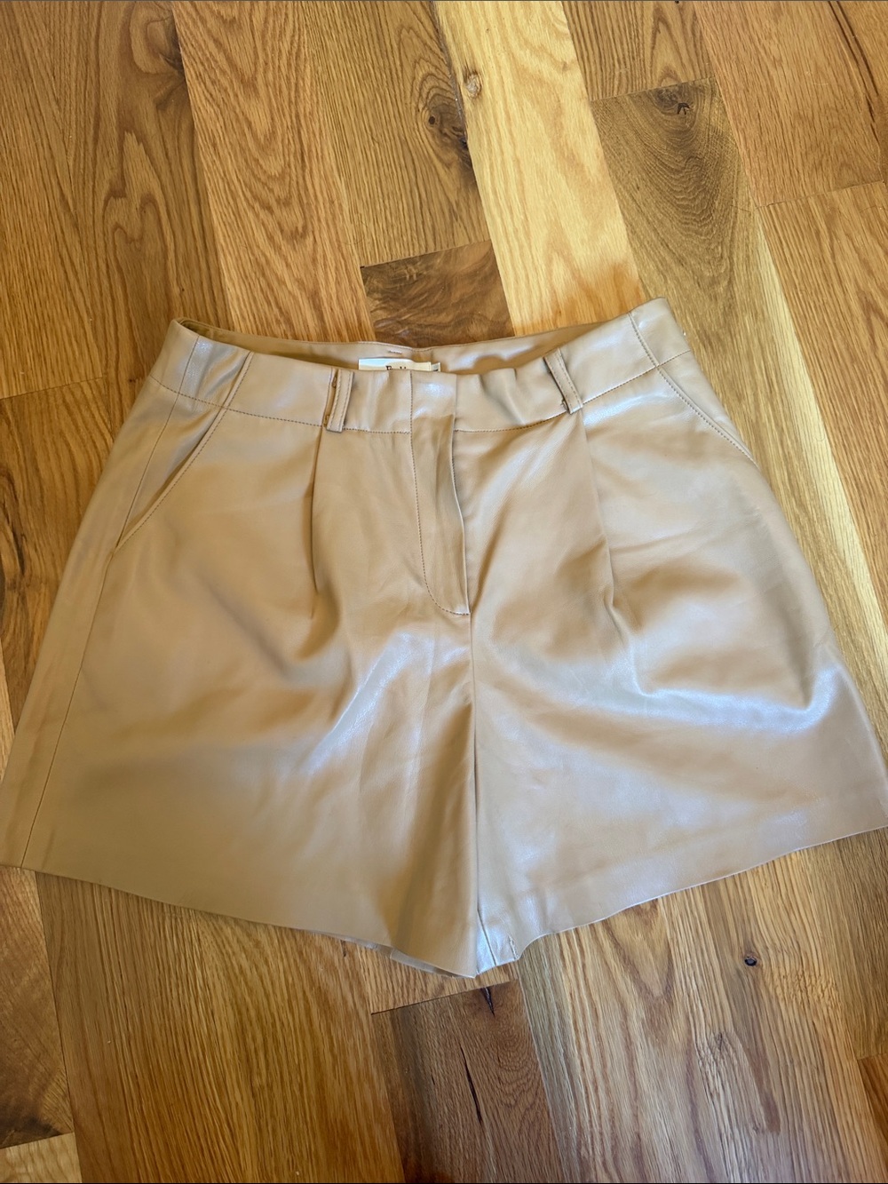 The Frankie shop High-Rise Faux Leather Shorts in Beige